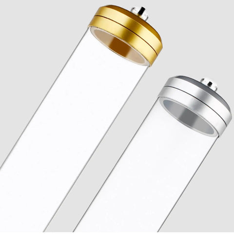 Wall Mounted Coffee Bean Dispenser And Tea Jar Keeps Your Daily Grind Locked Tight For Quick Grab Access While Saving Precious Counter Space With A Smooth Clear Display Rack In Sleek Silver Finishes - gold and silver tubes close-up.