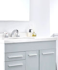 Widespread 8 Inch Bathroom Faucet With 2 Handles, 3-Hole Lavatory Sink Mixer In Chrome on modern white vanity countertop.