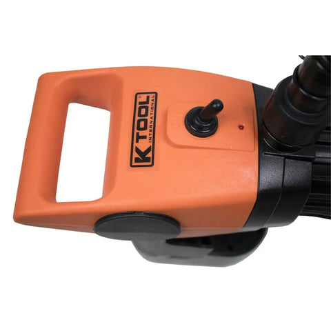 No Fuss Cordless 19.2V Drum Pump With Telescopic Tube Fitting 55 Gallon Barrels And Ibc Tanks Featuring 2 Inch Bung Adapter And 28 Lpm Flow For DEF Diesel Water Or Light Oils Built To Last close-up of pump handle and switch