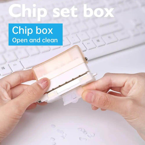 Hands holding a transparent brown Six Hole Round Paper Punch Handheld Circle Punch, pocket-size for planners, on a keyboard background.