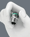 Hand holding a Zyklop Pro Grade Three Eighths Inch Drive Socket With Ball Intercept Ring, Twelve Millimeter Hex Head, rear knurling visible.