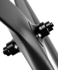 Close-up of Carbon Tri-Spoke Road Wheelset 700c Tubeless Ready hub detail, featuring V Brake Compatible Shimano 8-12 Speed Cassette Fit