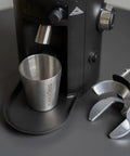 Barista Level Electric Coffee Grinder With Stepless Control And 54Mm Steel Flat Burrs Delivers Hella Consistent Grounds For Quick Home Brewing showing stainless steel cup and grinder features.