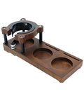 Level Up Your Daily Grind With This Solid Wood Espresso Tamping Station And Deep Portafilter Holder Mat featuring a heavy wood base and recessed channels.