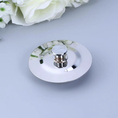 Bathtub Drain Stopper Silver Stainless Steel for 40-45mm Holes, sleek round design on a soft background, easy to clean