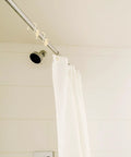 Half Round Shower Curtain Hooks 12 Pack Zinc Frosted Silver Hanging Rings glide smoothly on shower rod with white curtain.