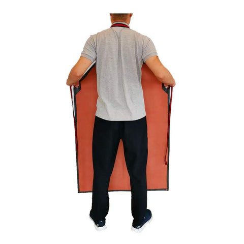 Person holding Thick Rubber Apron Workhorse For Dishwashing, Cleaning, Fishing, Lab Work, And More; grey apron visible from back.
