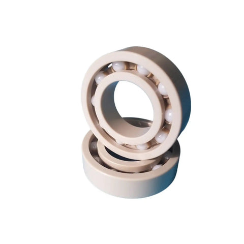 Precision Ceramic Ball Bearings Set Rust Proof High Heat Resistant Slick Smooth Operation Built Like A Truck Zero Drama For Heavy Loads Includes 100 Pieces In Sizes 627 693 Through 699 And 7X22X7MM close-up view of ceramic bearings with internal balls.