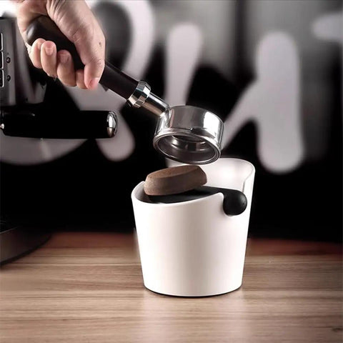 Barista using Orange ABS Coffee Knock Box 2.5L Open Top With Non Slip Base Lightweight For Home Cafe Barista Grade Espresso Gear Indoor Use