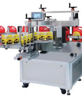 Automatic Round Bottle Labeling Machine For Wine And Spirits High Volume Commercial Packaging Equipment No Sweat Setup Precision Calibration Smooth Operator Workflow with red containers and yellow labels.