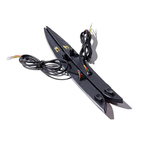 Slick All-In-One Rear Bumper Combo Lights For Tesla Model Y 2020-2023 featuring two black light bars with wiring harness.