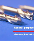 Set of four Drill America HSS 2-flute single-end mills, 15/16 in x 3/4 in, on blue background