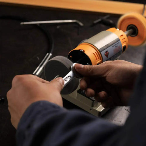 Person using adjustable speed polishing machine for jewelry, woodworking, and DIY, featuring smooth bearings and dust proof motor.
