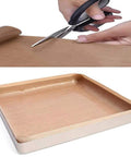 Three Pack 16x24 Inch PTFE Teflon Sheets, 0.11mm Thick, Nonstick Heat Press Sheets shown in use and trimmed with scissors