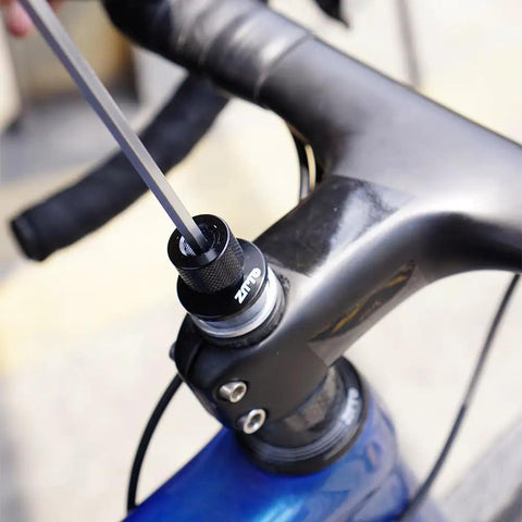 Close-up view of Road Bike Shifter Angle Measure Tool Adapter in use on a black bicycle handlebar, showcasing precise alignment features.