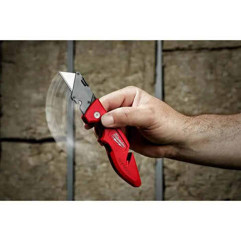 Hand deploying Fastback Press And Flip Utility Knife With Belt Clip And Onboard Wire Stripping Red Set Of 4 Durable Precision Cutting
