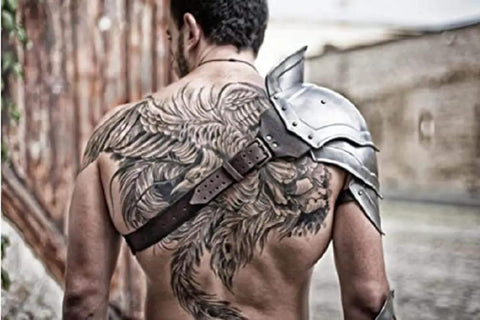 Beefy Steel Armor Pauldron for Gladiator Cosplay and Larp Knight, worn by man with back tattoo, showing handcrafted metal detail.