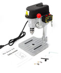 Totally Legit Heavy Duty Mini Bench Drill Press 340W Variable Speed Portable Tool With Rock Solid Cast Iron Base on worktable.
