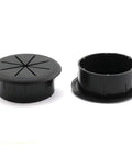 Flexible Desk Cord Grommet Pair Black Wire Organizer Hole Covers for managing PC desktop cables on a white background