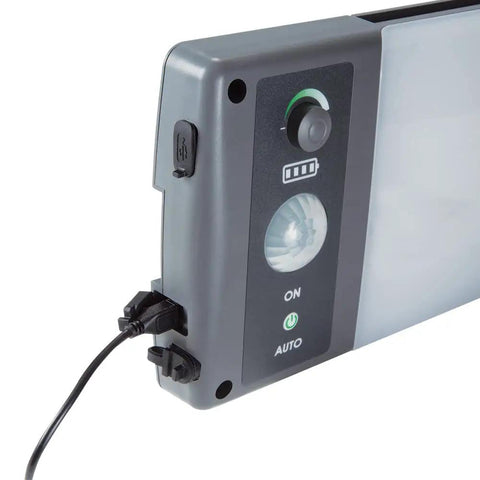 Close-up of Outdoor Solar LED Area Light With Motion Activation And USB Charging No Wiring Needed 8800mAh Battery Delivers 15 Plus Hours Runtime 360 Degree Motion Sensor Portable Weatherproof Black And Gray, showing control panel and charging port.