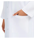 Close-up of hand in pocket of Three Pocket Women's Lab Coat With Long Sleeves White Medical Coat Relaxed Fit Size M