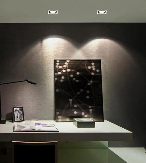Recessed LED Ceiling Light, Downlight illuminating a desk area with modern decor and a black wall art piece.