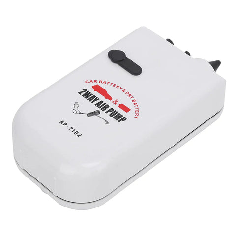 White 2-way air pump with black switch, labeled for car and dry battery use, model AP-2102, on a plain background.