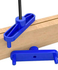 TorSor center scribe line locator tools, blue 2-pack, mounted on a wood edge.