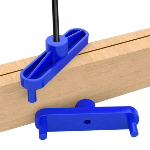 TorSor center scribe line locator tools, blue 2-pack, mounted on a wood edge.