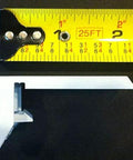 Three Duette Brackets For Applause And Duette Shades By Hunter Douglas shown with measuring tape for size reference