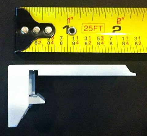 Three Duette Brackets For Applause And Duette Shades By Hunter Douglas shown with measuring tape for size reference