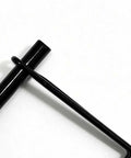 Close-up of Four Pack Heavy Duty Trailer Hitch Pin One Quarter Inch By Four Inch Black Zinc Coated Carbon Steel Coupler Lock Pin Quick Release Tow Pin Built Tough For Secure Towing Durable Hitch Hardware For Trailer And Truck showing zinc-coated finish.