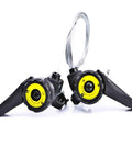 One Pair Universal Bicycle Shifters Thumb Gear Levers 15 18 21 Speed For Mountain Road Folding Bikes Left And Right Handlebar Shifters With Cable Easy Adjust Smooth Shifting, black plastic and metal, with yellow indicators and attached cable.