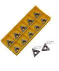 20pcs TCMT carbide turning inserts in a yellow plastic storage tray; triangular with central hole.