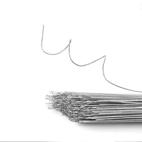 Stack of Aluminum Chain Link Fence Ties 8 Inch 100 Pack 12.5 Gauge Wire Hook Ties suitable for various outdoor fencing needs.