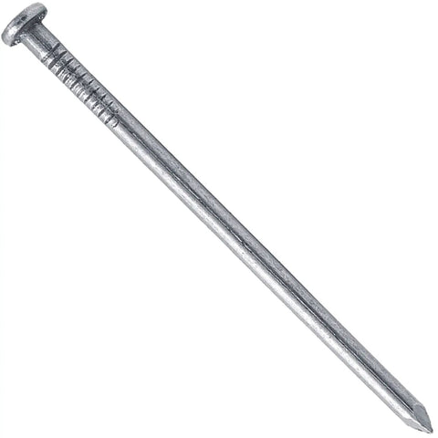 Real Deal Jobsite Staple Tough As Nails Two And One Half Inch Bright Common Framing Nail Heavy Duty Carbon Steel Smooth Shank General Purpose Structural Fastener One Pound Box close-up of a smooth shank nail