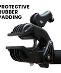 Close-up of heavy duty clamp with protective rubber padding on Mechanic Bike Repair Stand With Adjustable Height And Tilt Pro Grade Quick Release 360 Degree Rotation Heavy Duty Clamp Holds Up To 55 Lbs Works With Standard Mountain And Road Bikes Tool Plate Included.