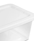 Close-up of clear plastic storage bin with lid 6 quart stackable organizer for closet, shoe, craft, office, and pantry organization