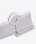 2X Clear Milk Carton Sealing Clips Keep Boxed Drinks Fresh And Prevent Messy Spills In Dorms, Studios, And Kitchens. Close-up of white plastic clip with locking mechanism.