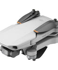 Ultra Lightweight Mini 4K Foldable Drone Fly More Bundle With 64GB Pro Card, folded state, compact design, gray color.