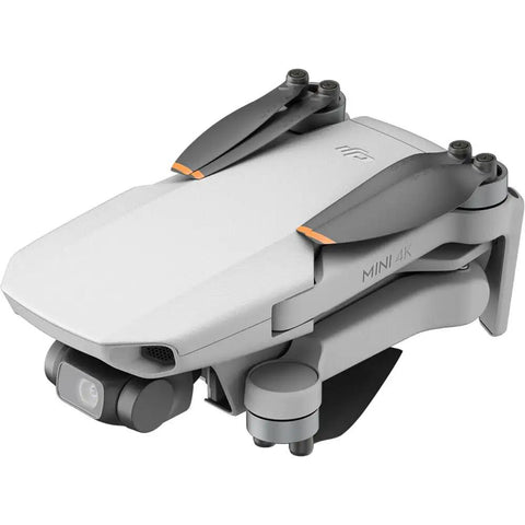 Ultra Lightweight Mini 4K Foldable Drone Fly More Bundle With 64GB Pro Card, folded state, compact design, gray color.