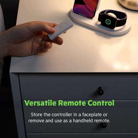 Person holding Stage Scene Smart Remote For Apple HomeKit With Thread Dope Easy Control Of Smart Lights And Switches on table.