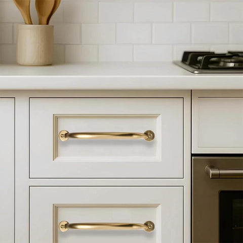 3 Inch Hole Center Brushed Brass Cabinet Pulls 10 Pack installed on white kitchen drawers, showing clean and modern look.