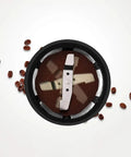 Kickstart Your Daily Grind With This Compact Full Automatic Bean To Cup Coffee Machine Featuring Stainless Steel Blades And Anti Drip Design For Seamless One Touch Brewing That Hits Different Every Single Day - stainless steel blades in coffee grinder with ground coffee and beans.