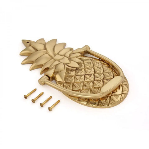 8 Inch Solid Brass Pineapple Door Knocker With Mounting Hardware Dope Front Door Accessory Premium Finish Durable Brass Construction For Timeless Curb Appeal lying flat with screws
