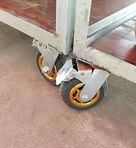 Heavy Duty 200mm Rubber Swivel Casters With Locking Brakes Set Of Four on a utility cart, showcasing sturdy design and smooth rolling.