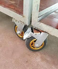Heavy Duty 125Mm Rubber Swivel Caster Wheels With Brakes Set Of Four for furniture mobility, showing close-up view of casters on a cart.