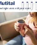 Mutital water filter cartridges four-pack (white with blue caps) with Mutital logo; person sipping coffee from a pink mug