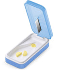 Open blue pill cutter with removable silicone liner showing split pills inside. Pill Cutter With Removable Silicone Liner For Tiny And Large Pills No Fuss Sleek Pill Splitter For Precise Cuts On Any Size Pill Easy To Use At Home For You Family And Pets Professional Grade Blue.