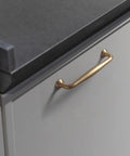 Six Pack 5 Inch Center To Center Modern Champagne Bronze Cabinet Pulls installed on kitchen cabinet